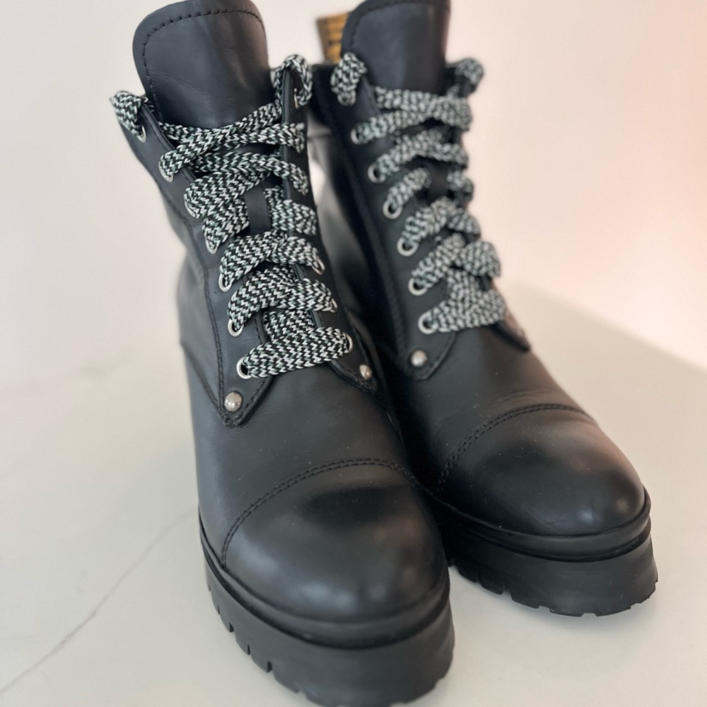 Miu Miu Lace-Up Leather Combat Boots in size 39.